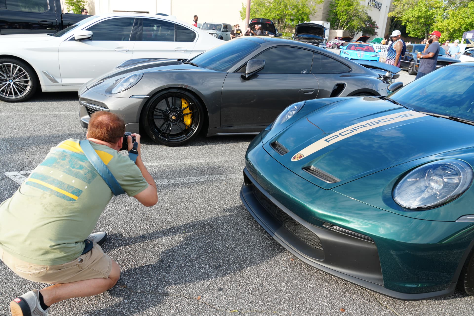 HighPoint Gravity photographer capturing Porsche sports cars at an outdoor event